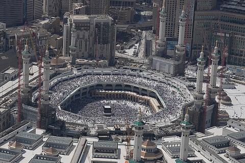 Muslim pilgrims circumambulate the Kaaba, the cubic building at the Grand Mosque, during the annual Hajj pilgrimage in Mecca, Saudi Arabia, Monday, June 17, 2024